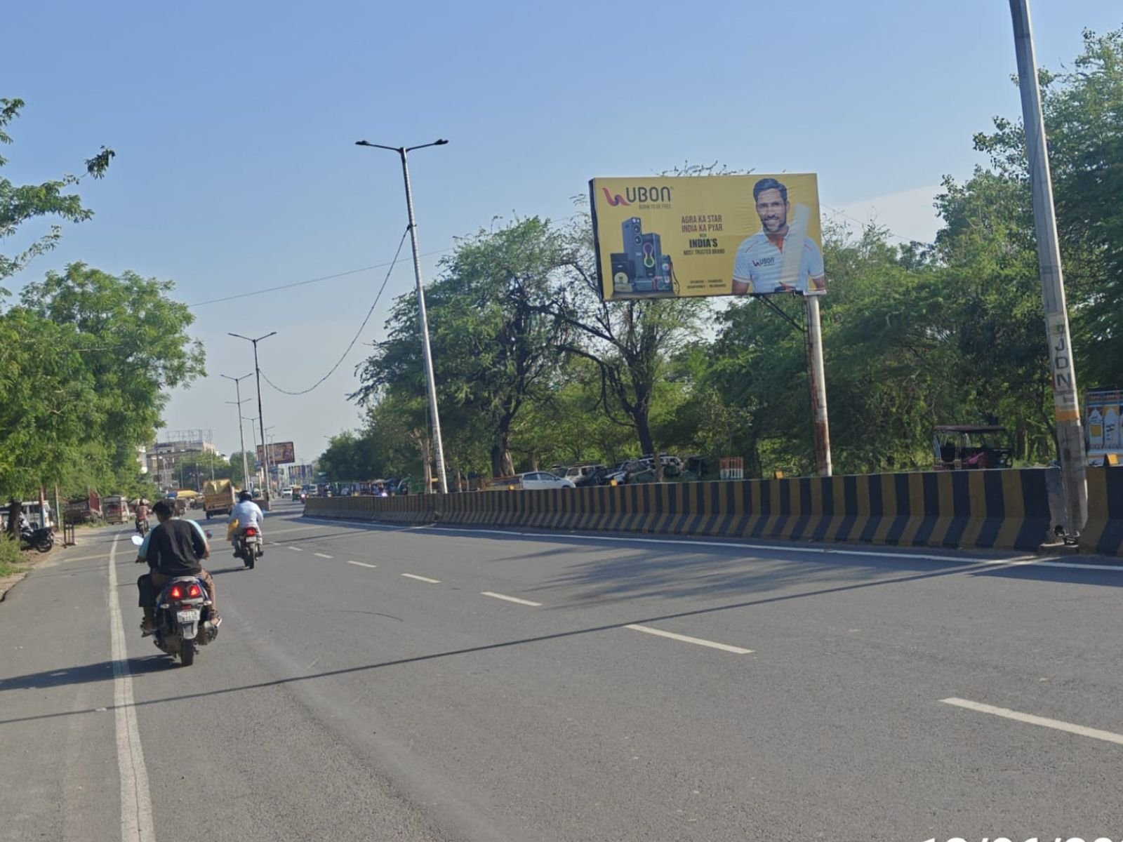 Outdoor hoarding advertising on a highway in India